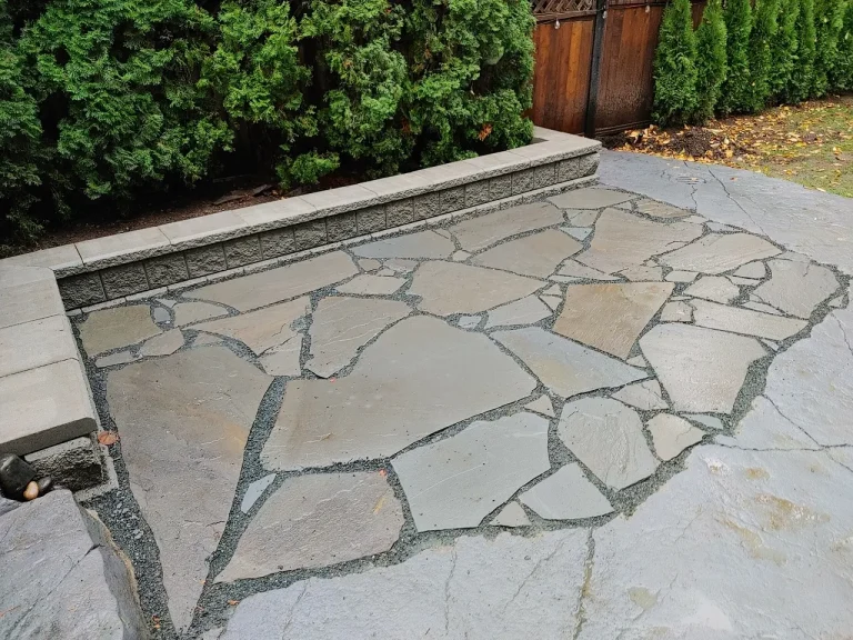 flagstone patio connecting to a stamped concrete patio