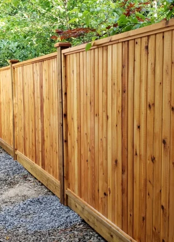 stained fence on the side of a home in langley b.c.